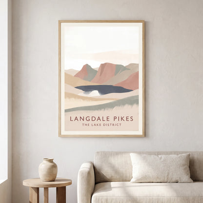 Langdale Pikes travel poster in a natural frame, hanging in a living
