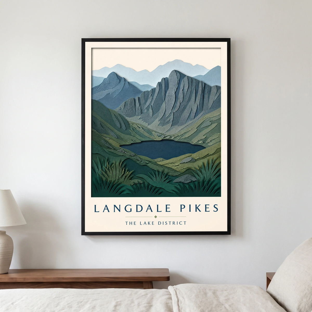 Langdale Pikes travel poster in a black frame, hanging in a bedroom3