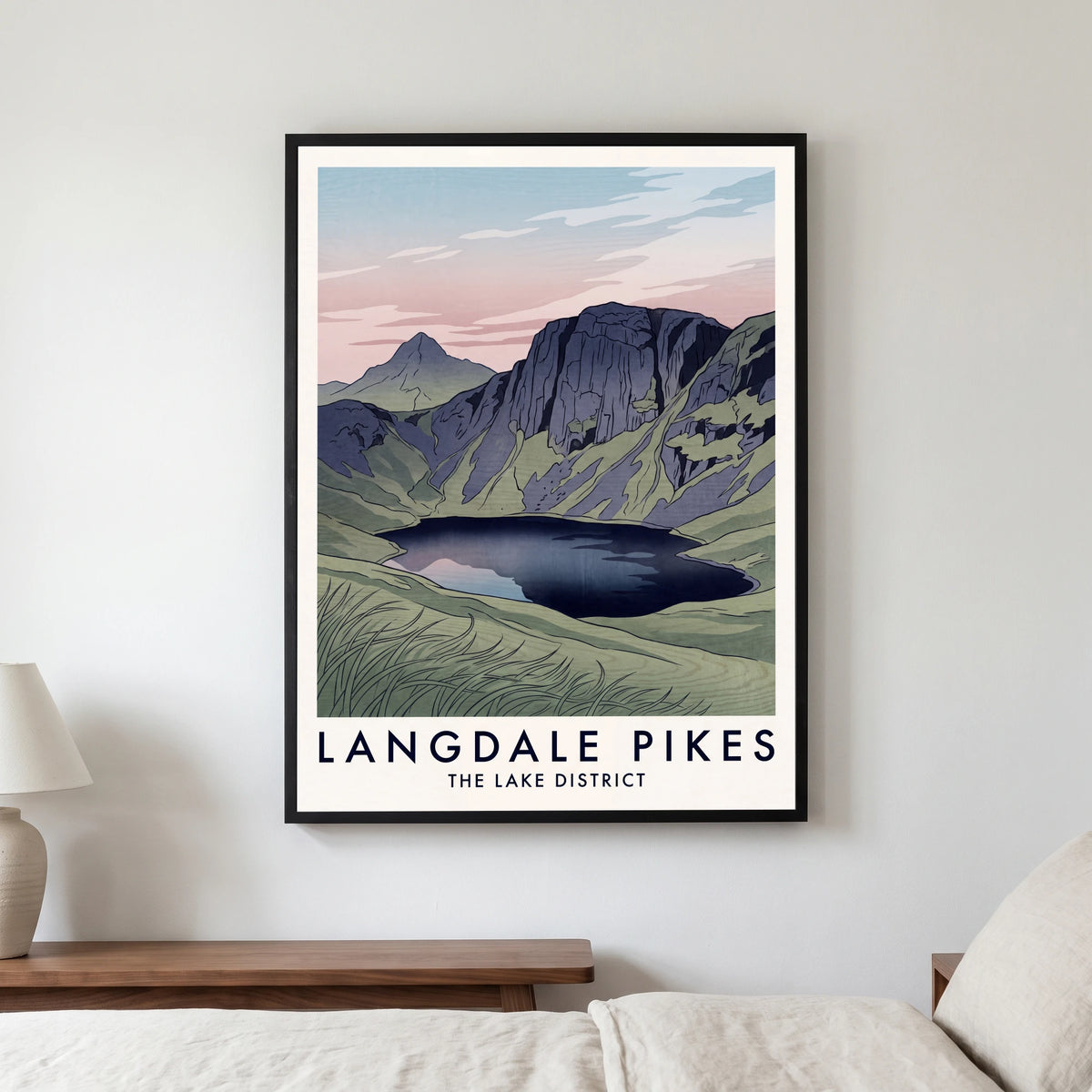 Langdale Pikes travel poster in a black frame, hanging in a bedroom3