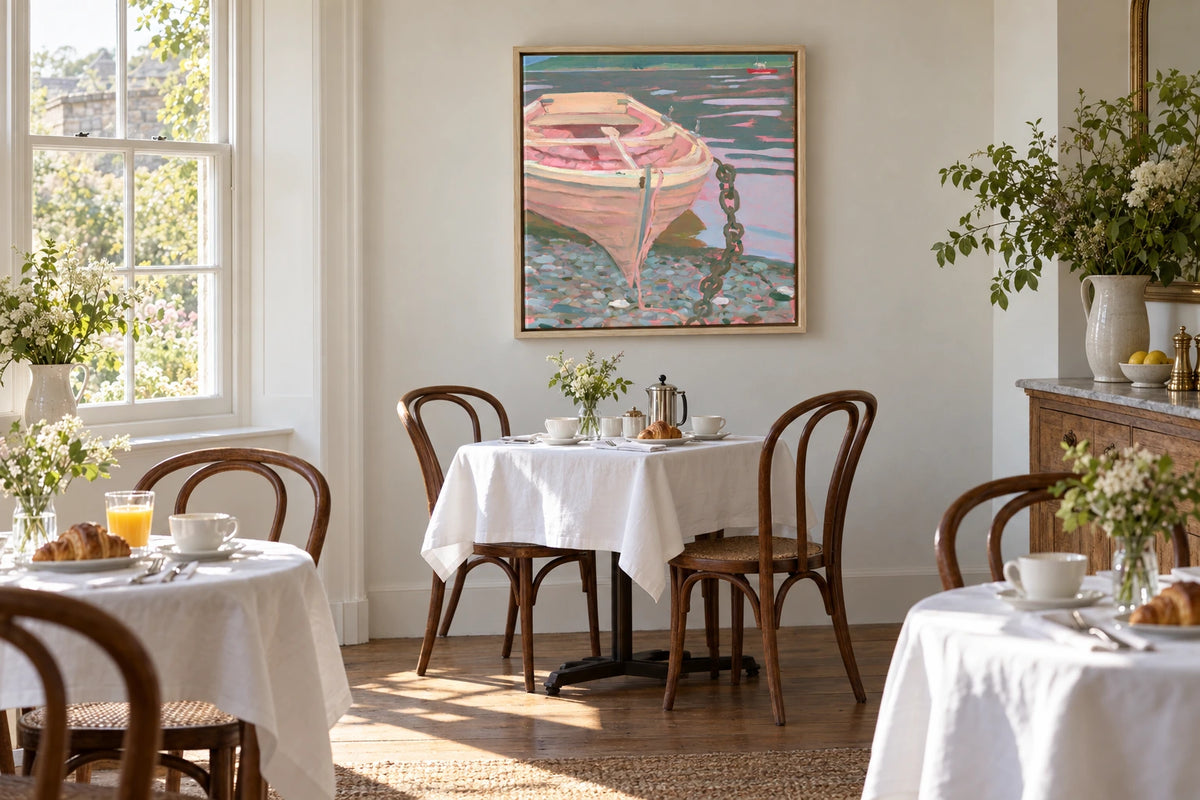 A framed Windermere painting hanging in b&b breakfast room