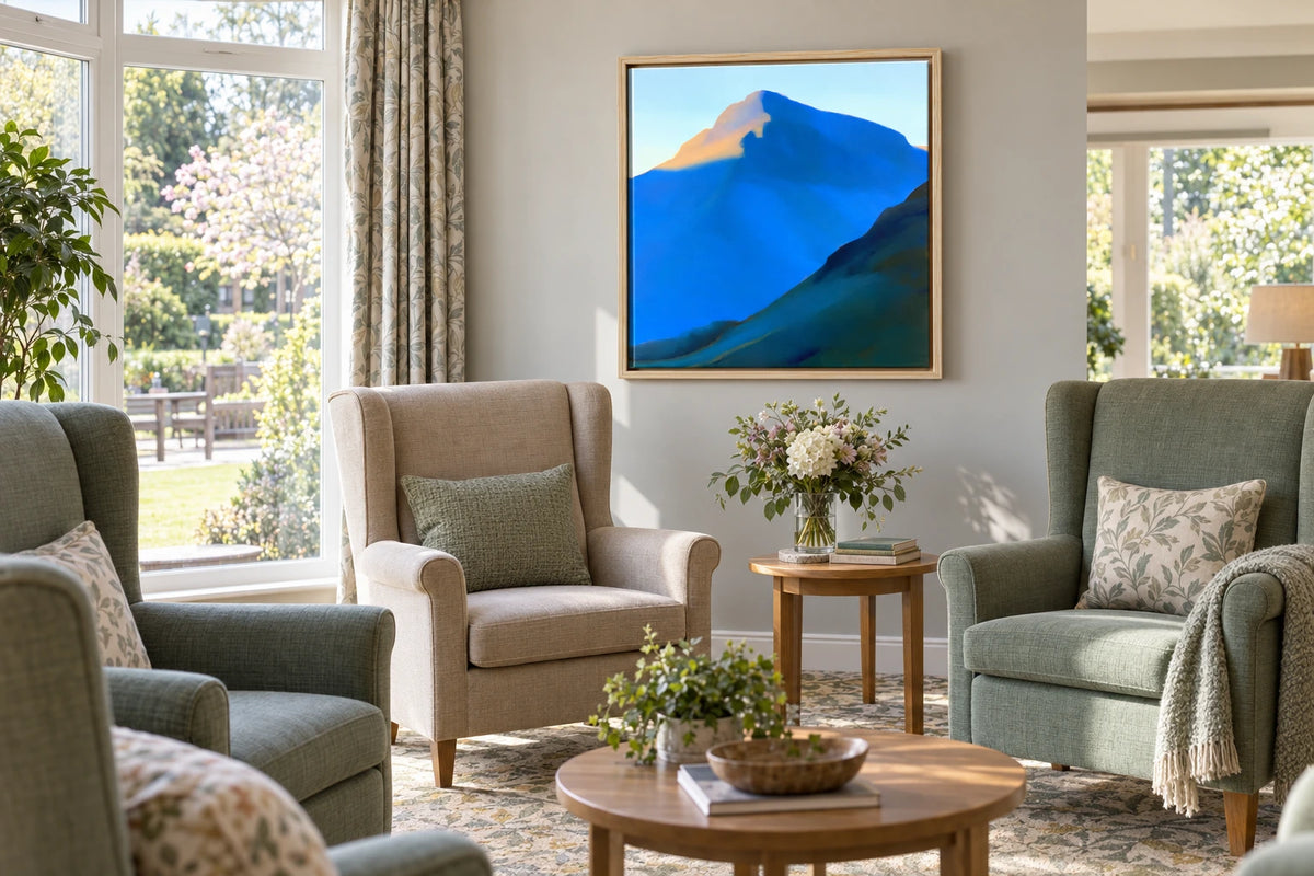 A framed Great Gable painting hanging in care home lounge