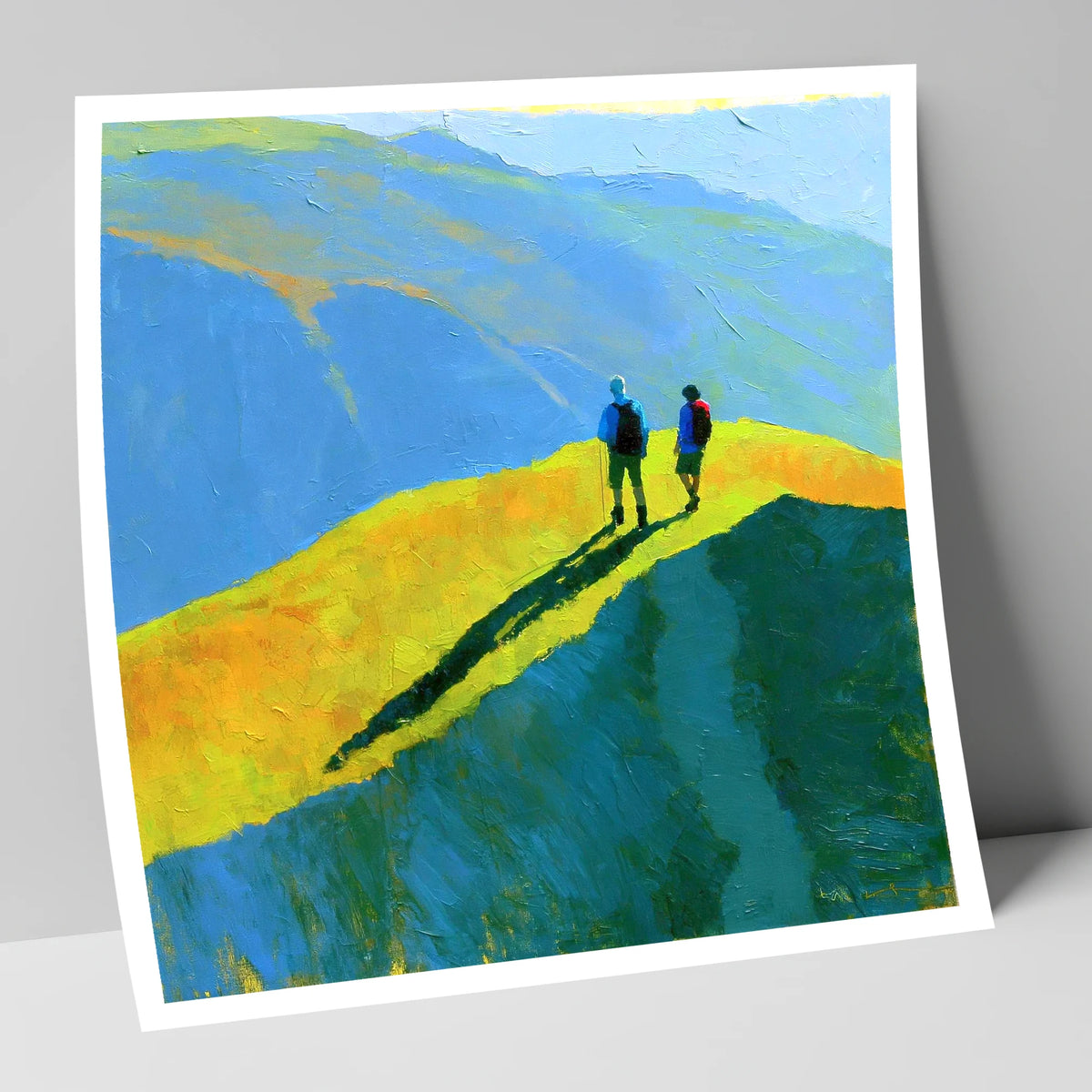 Unframed giclee art print of fell walkers on a sunlit Lake District ridge