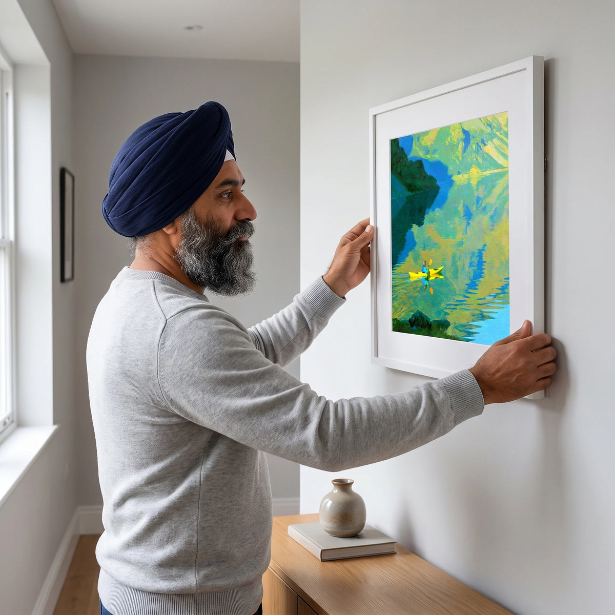 Yellow Kayak on Reflecting Fells — Framed Print · White · 40cm shown in a home interior