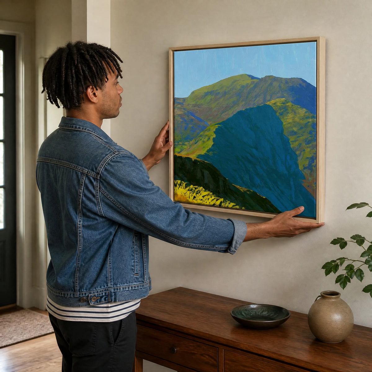 Sunlit Crags of Wetherlam Ridge — Framed Canvas · Natural · 70cm shown in a home interior