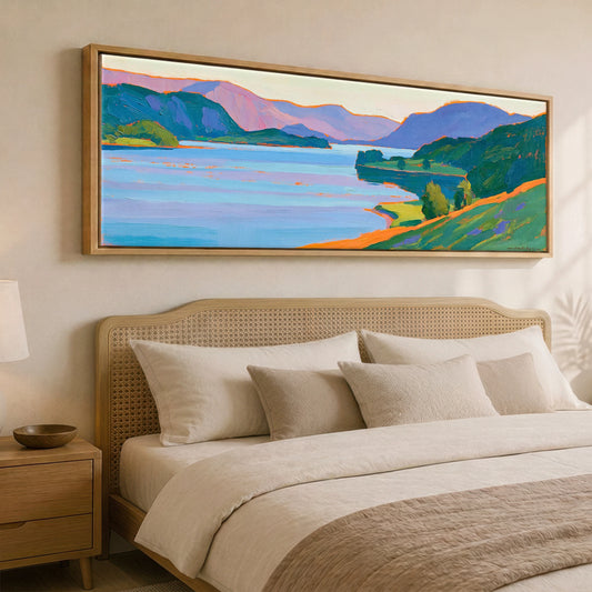 Ullswater with Vibrant Pink Fells Lake District Lake panoramic canvas wall art displayed above a bed