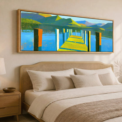 Sunlit Jetty and Vibrant Lakeland Fells Lake District Lake panoramic canvas wall art displayed above a bed