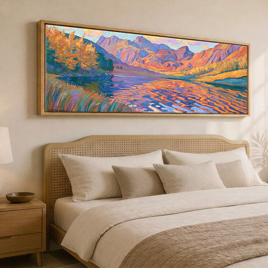 Vibrant Autumn Lakeland Tarn at Sunset Lake District Lake panoramic canvas wall art displayed above a bed