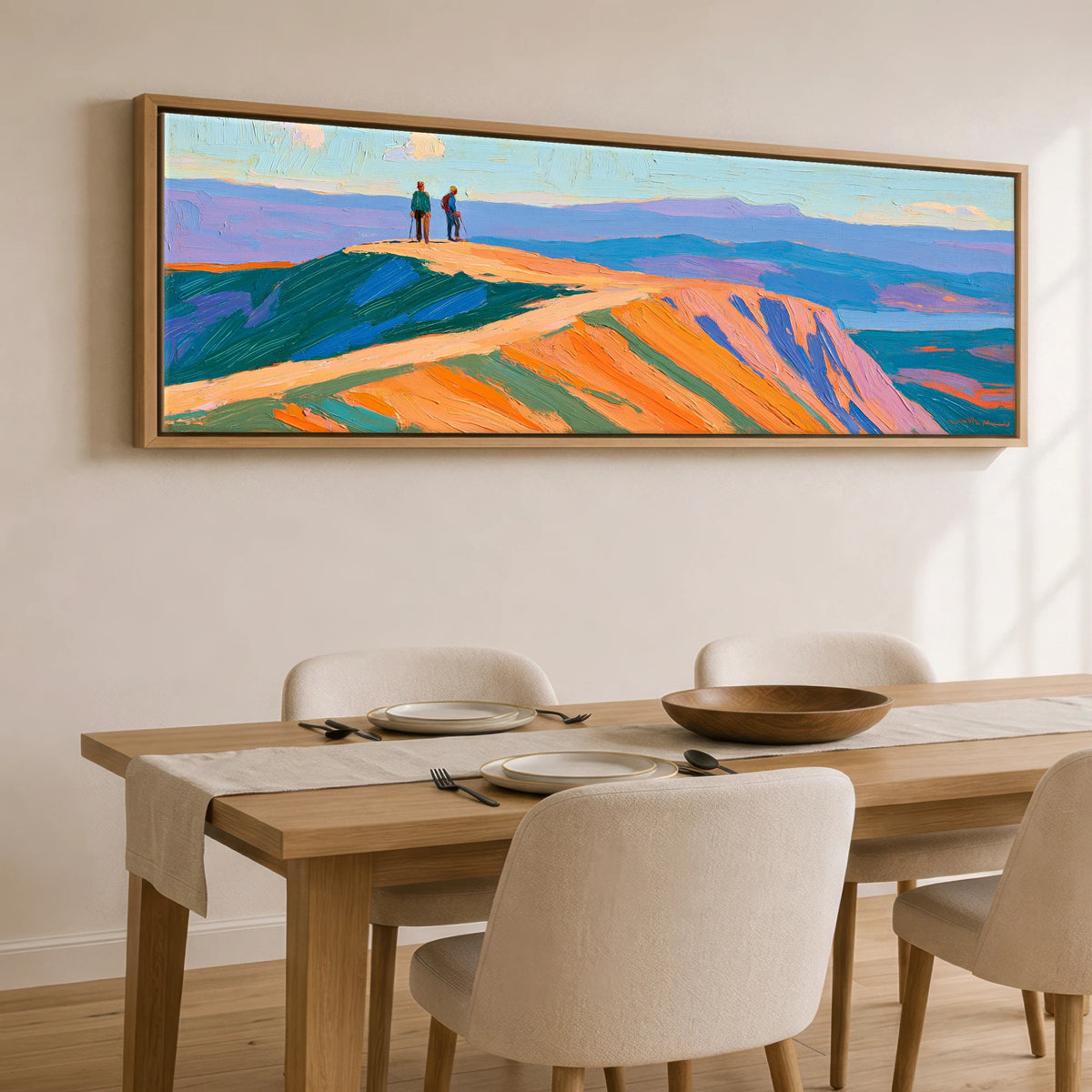 Hikers on a Radiant Fell Top Lake District Fell panoramic canvas wall art displayed above a dining table