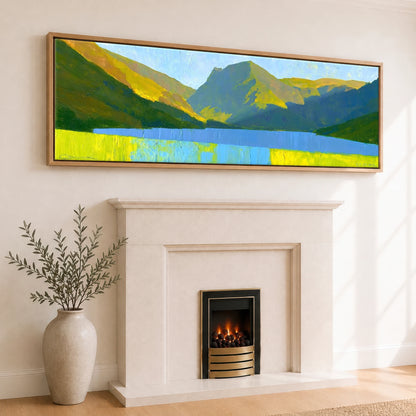 Luminous Fells Over Sapphire Water Lake District Lake panoramic canvas wall art displayed above a fireplace
