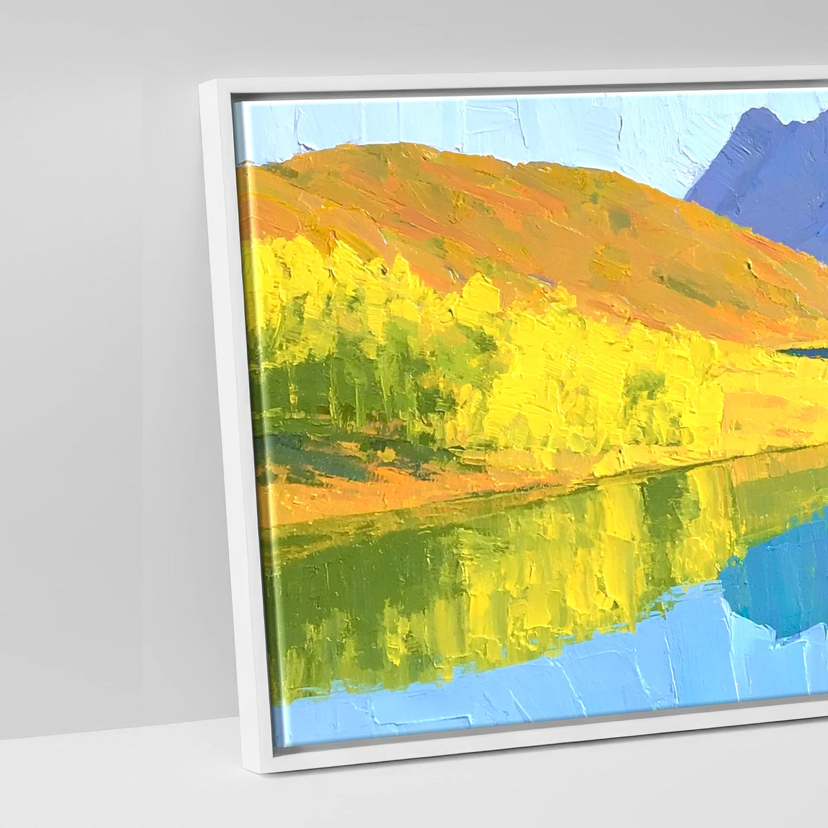 Sunlit Fells over Crummock Water Reflection - artwork detail in a white float frame