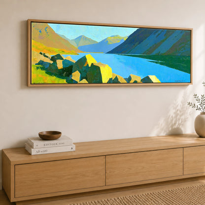 Wastwater Boulders and Sunlit Fells Lake District Lake panoramic canvas wall art displayed above a sideboard