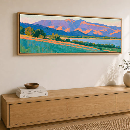 Skiddaw Massif in Vibrant Light Lake District Fell panoramic canvas wall art displayed above a sideboard