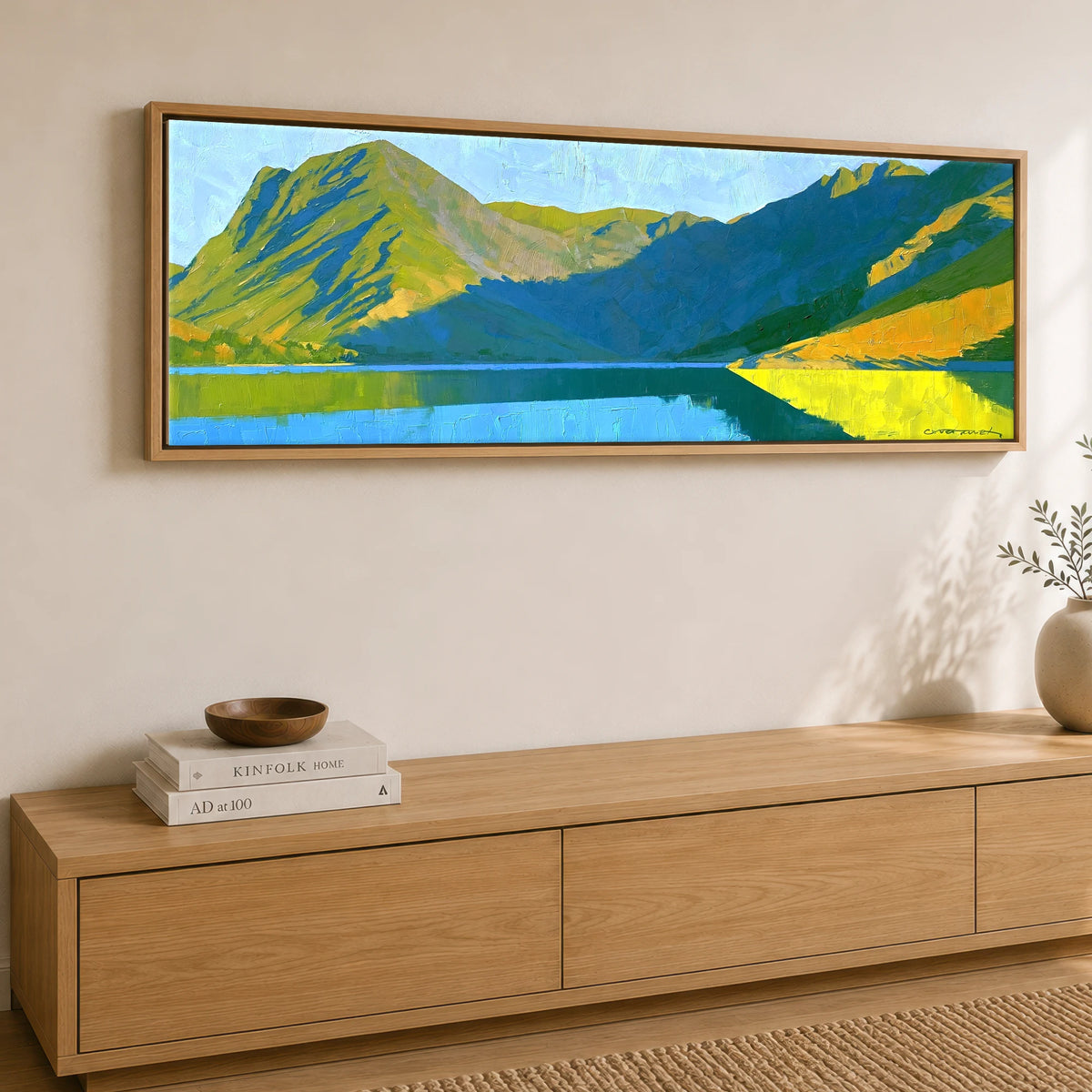 Sunlight and Shadow on Wast Water Screes Lake District Lake panoramic canvas wall art displayed above a sideboard
