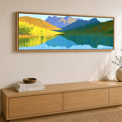 Sunlit Fells over Crummock Water Reflection Lake District Lake panoramic canvas wall art displayed above a sideboard