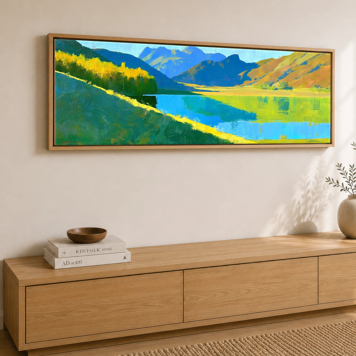 Sunlight and Blue Shadows over Buttermere Lake District Lake panoramic canvas wall art displayed above a sideboard