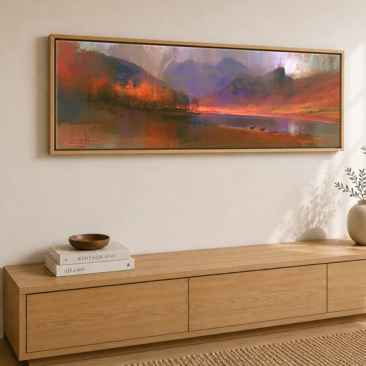 Autumn Larches at Blea Tarn Lake District Lake panoramic canvas wall art displayed above a sideboard