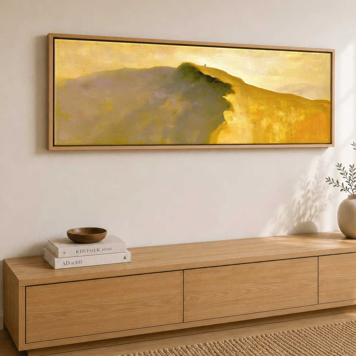 Striding Edge Walker in Golden Light Lake District Walking panoramic canvas wall art displayed above a sideboard