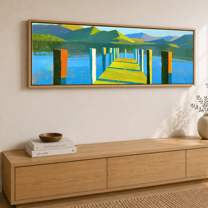 Sunlit Jetty and Vibrant Lakeland Fells Lake District Lake panoramic canvas wall art displayed above a sideboard