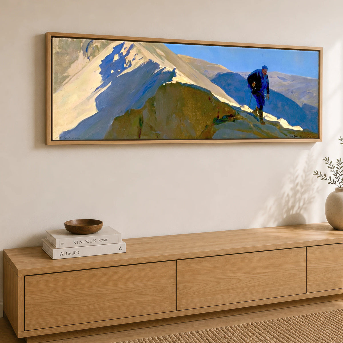 Walker on Sunlit Striding Edge Lake District Walking panoramic canvas wall art displayed above a sideboard