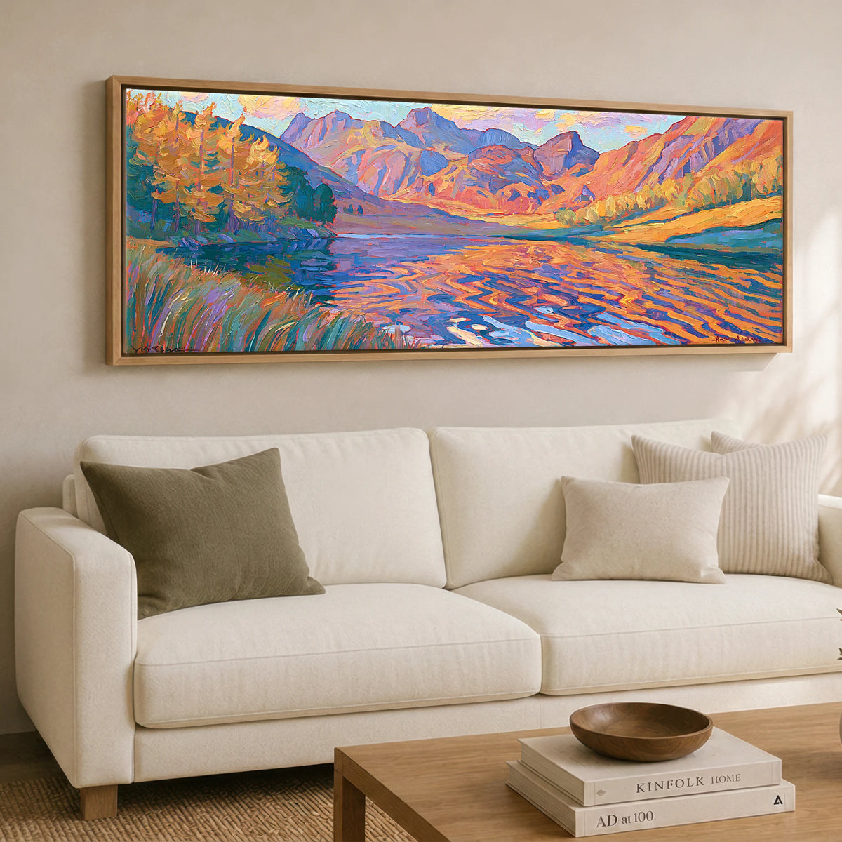 Vibrant Autumn Lakeland Tarn at Sunset Lake District Lake panoramic canvas wall art displayed above a sofa