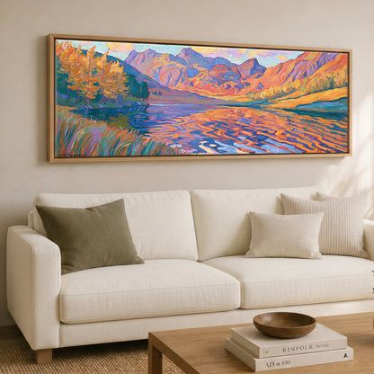 Vibrant Autumn Lakeland Tarn at Sunset Lake District Lake panoramic canvas wall art displayed above a sofa