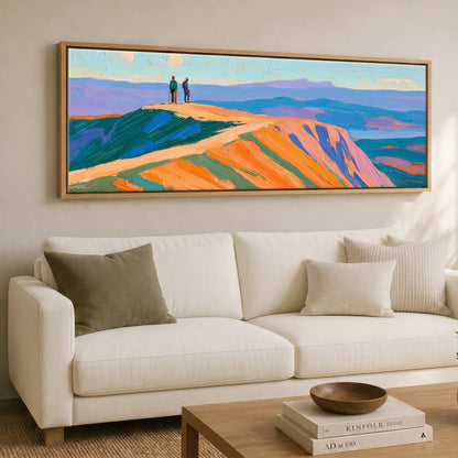 Hikers on a Radiant Fell Top Lake District Fell panoramic canvas wall art displayed above a sofa