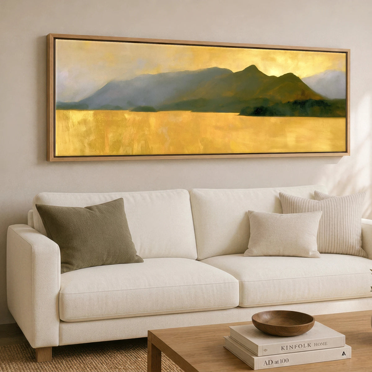 Catbells Silhouette in Luminous Gold Lake District Fell panoramic canvas wall art displayed above a sofa