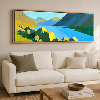 Wastwater Boulders and Sunlit Fells Lake District Lake panoramic canvas wall art displayed above a sofa