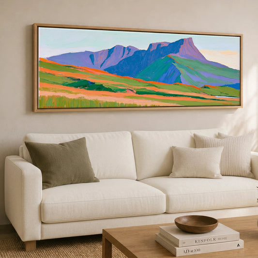 Scafell Pike in Bold Hues Lake District Fell panoramic canvas wall art displayed above a sofa