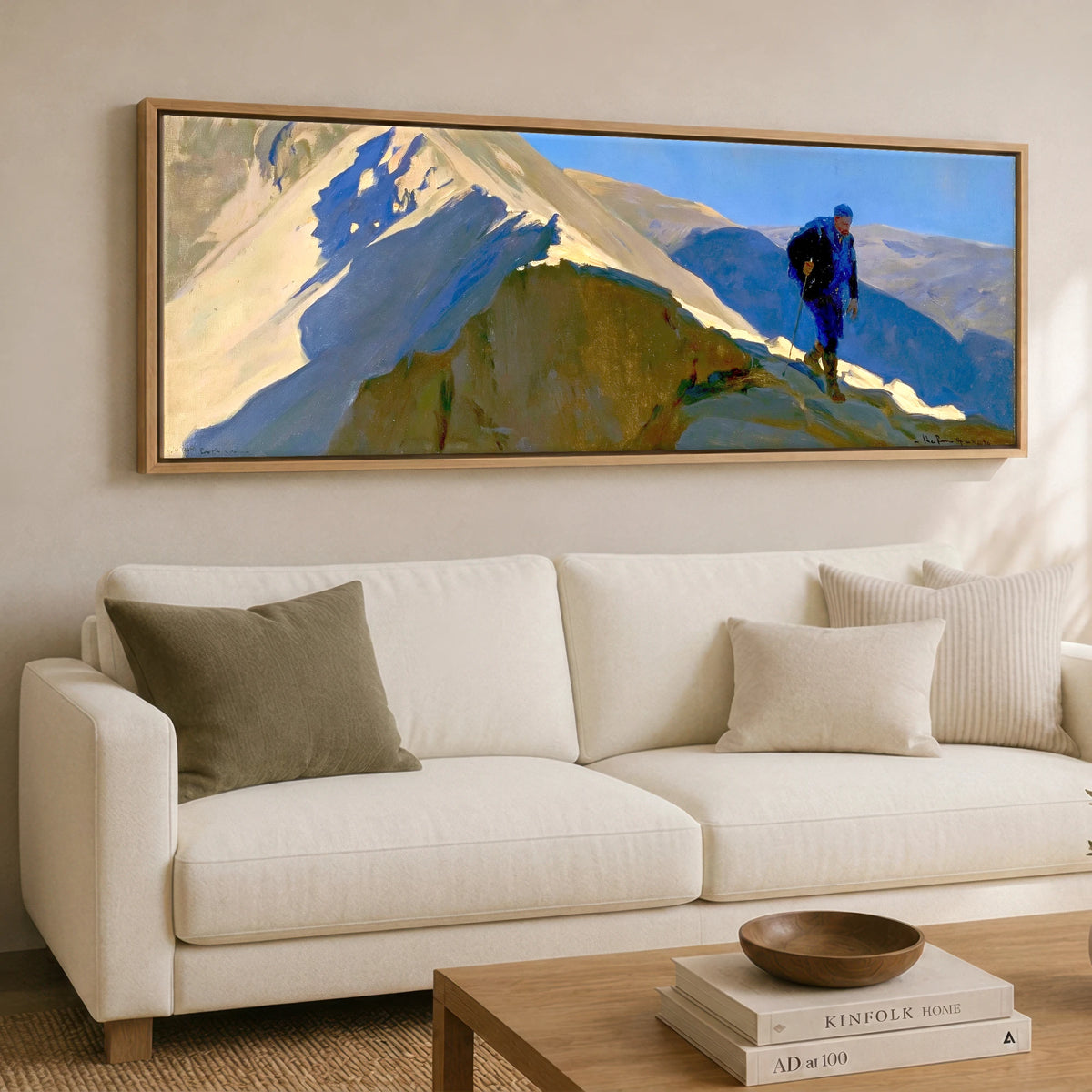 Walker on Sunlit Striding Edge Lake District Walking panoramic canvas wall art displayed above a sofa
