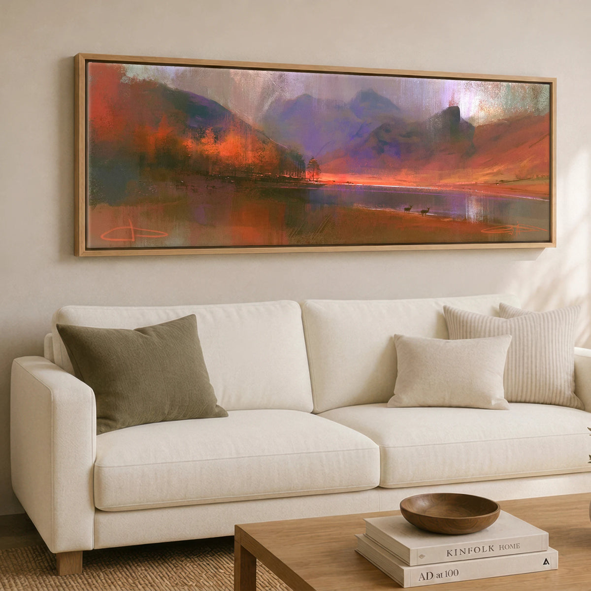 Autumn Larches at Blea Tarn Lake District Lake panoramic canvas wall art displayed above a sofa