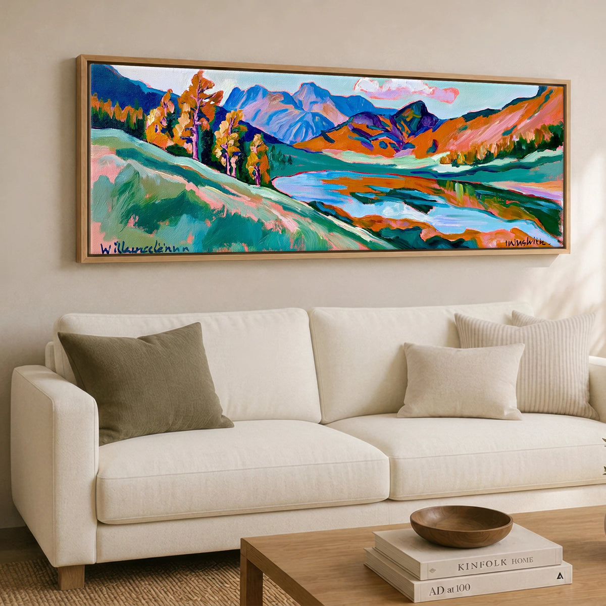 Vibrant Autumn Larches at Blea Tarn Lake District Lake panoramic canvas wall art displayed above a sofa