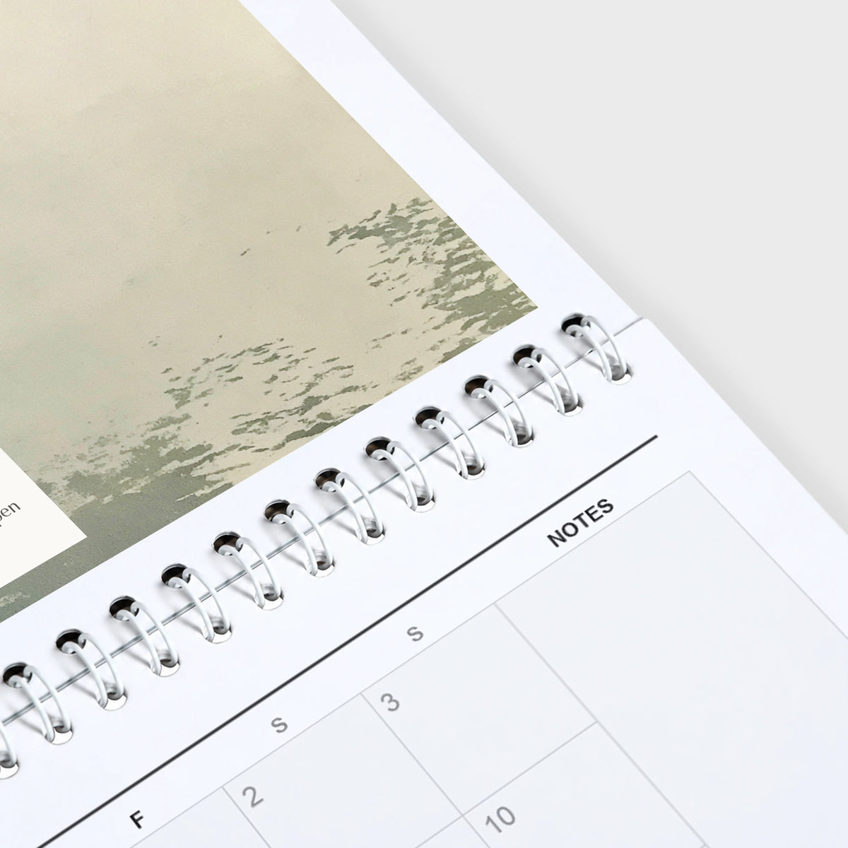 Phillip Marbury 2027 wall calendar hanging in a corner