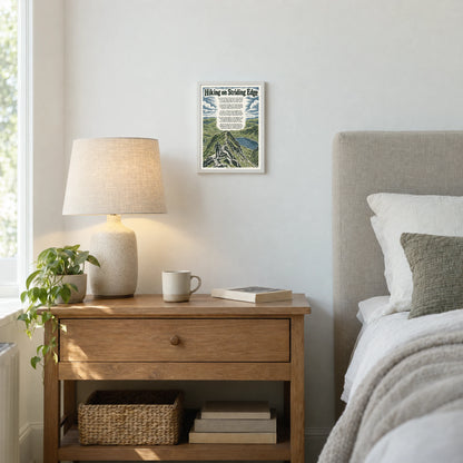 Hiking on Striding Edge poem print at A4 size, in a white frame, hanging in a bedroom