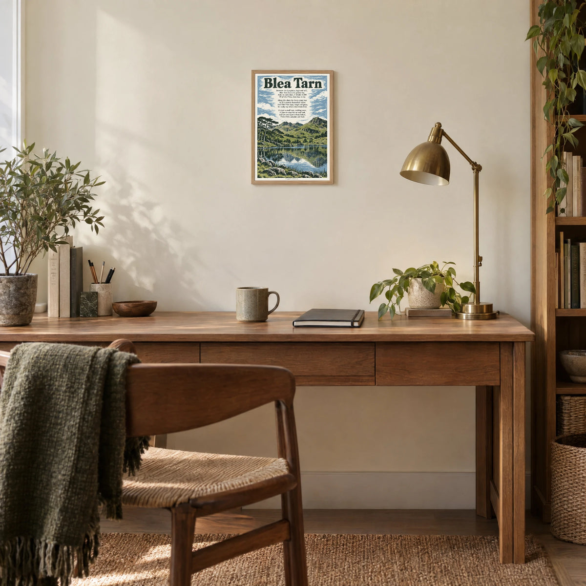 Blea Tarn poem print at A4 size, in a natural frame, hanging in a study