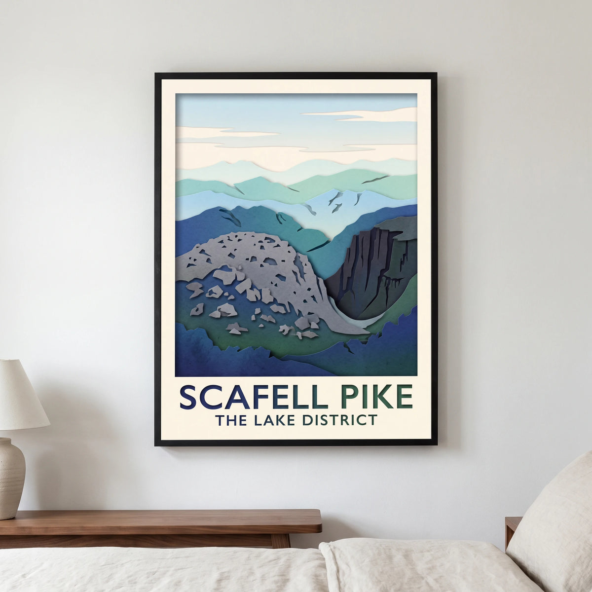 Scafell Pike travel poster in a black frame, hanging in a bedroom3