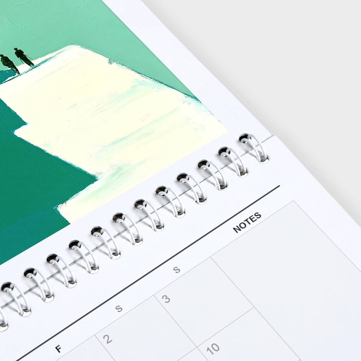 Sebastian Finch 2027 wall calendar hanging in a corner