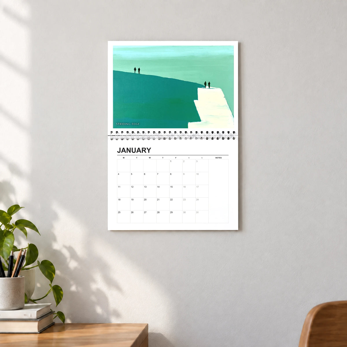 Sebastian Finch 2027 wall calendar hanging in a lounge