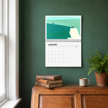 Sebastian Finch 2027 wall calendar hanging in a study
