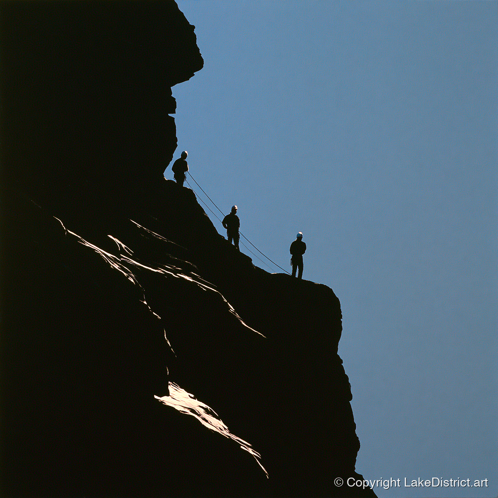 Silhouetted Climbers on a Crag - lake district walking art print and canvas by Adelaide Calloway A.I