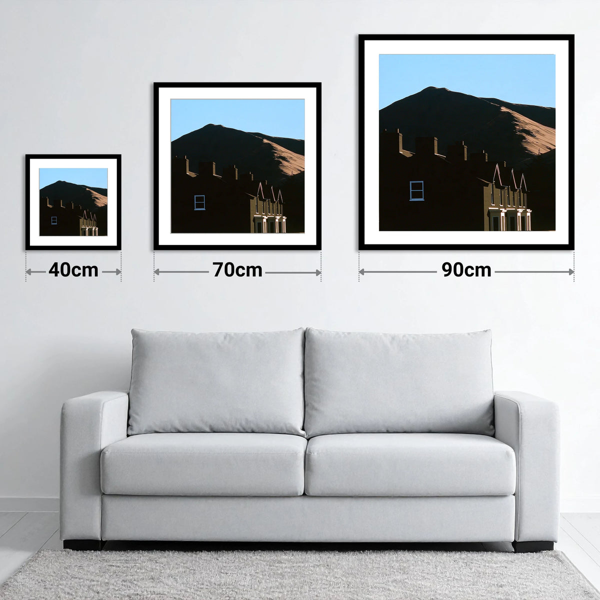Silhouetted Keswick Terraces Beneath Skiddaw - size guide showing 40cm, 70cm and 90cm art prints