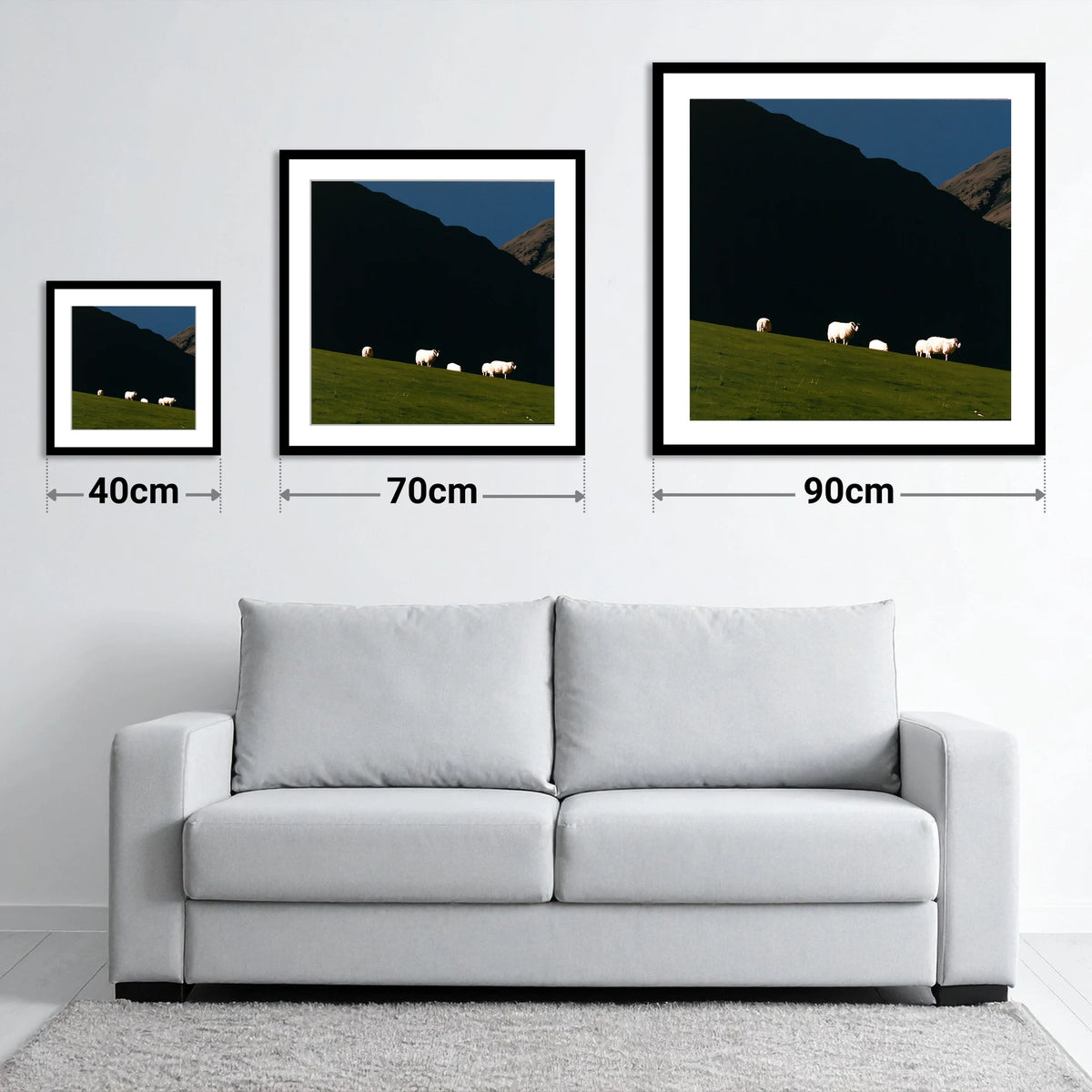 Sunlit Herdwicks on Dark Fellside - size guide showing 40cm, 70cm and 90cm art prints