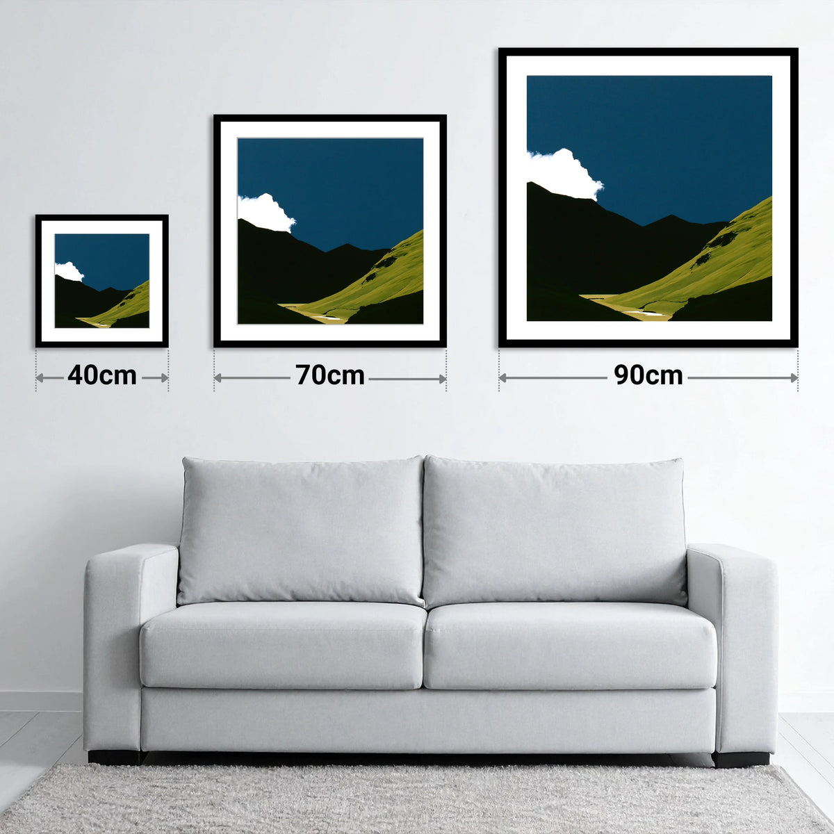 Sunlit Fell Under Storm Cloud - size guide showing 40cm, 70cm and 90cm art prints