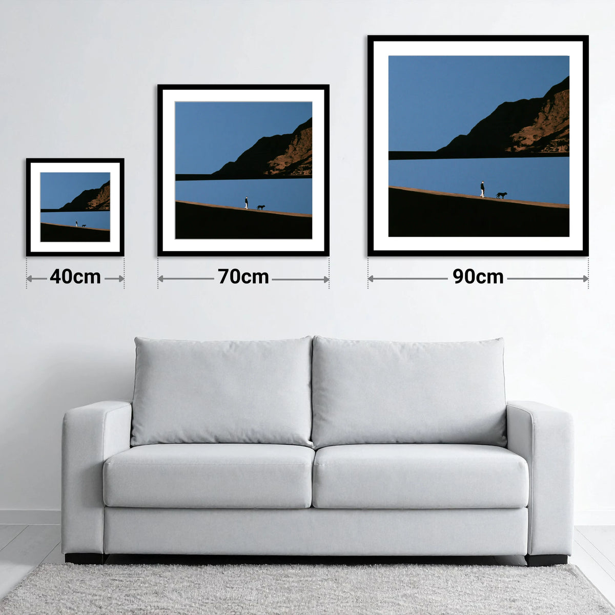 Silhouetted Dog Walker at Ennerdale Water - size guide showing 40cm, 70cm and 90cm art prints