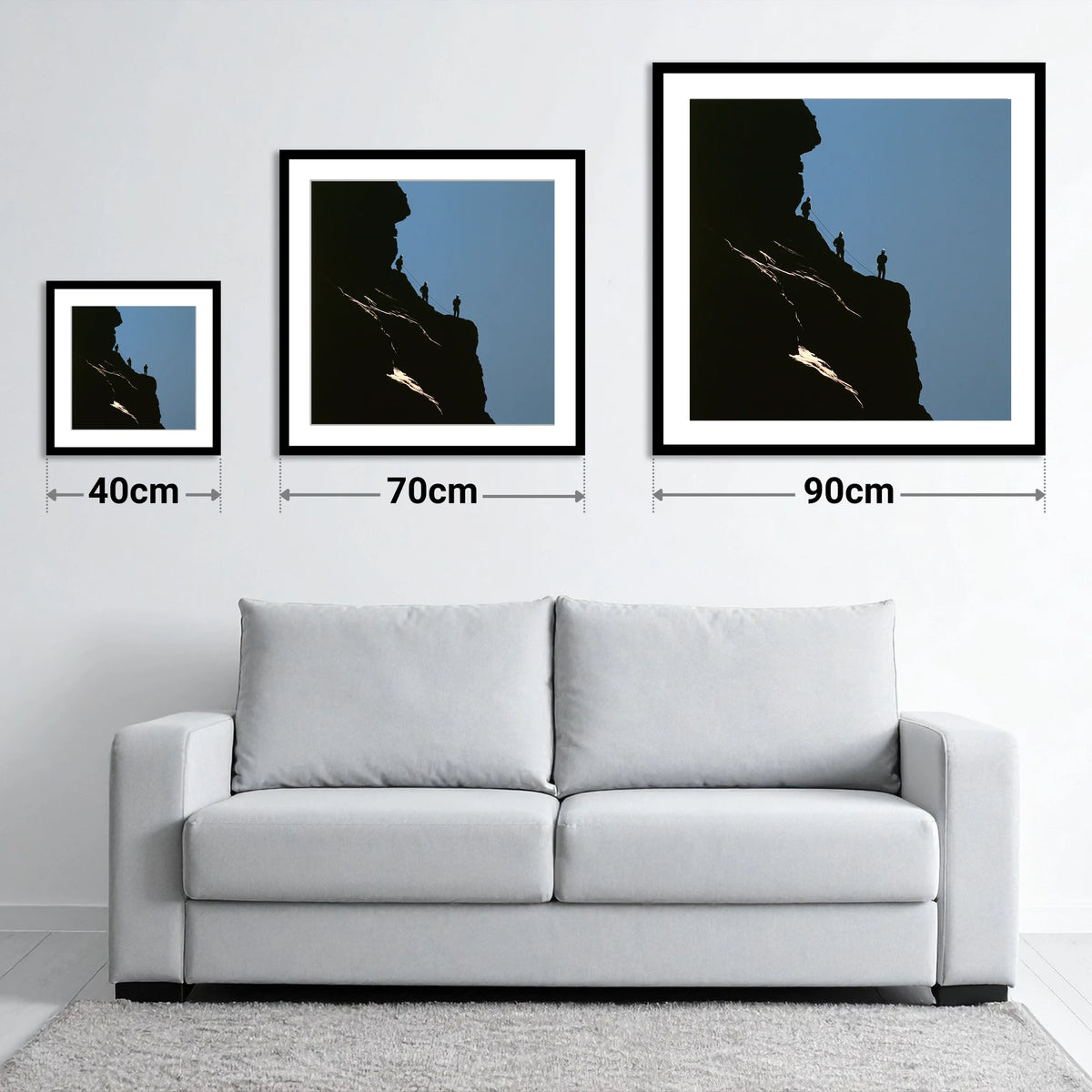 Silhouetted Climbers on a Crag - size guide showing 40cm, 70cm and 90cm art prints