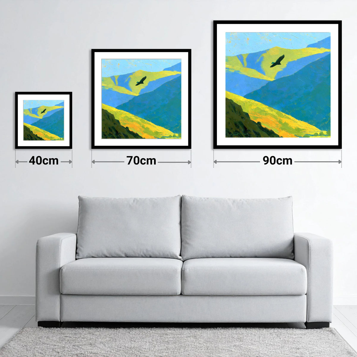 Soaring Bird of Prey Over Sunlit Fells - size guide showing 40cm, 70cm and 90cm art prints
