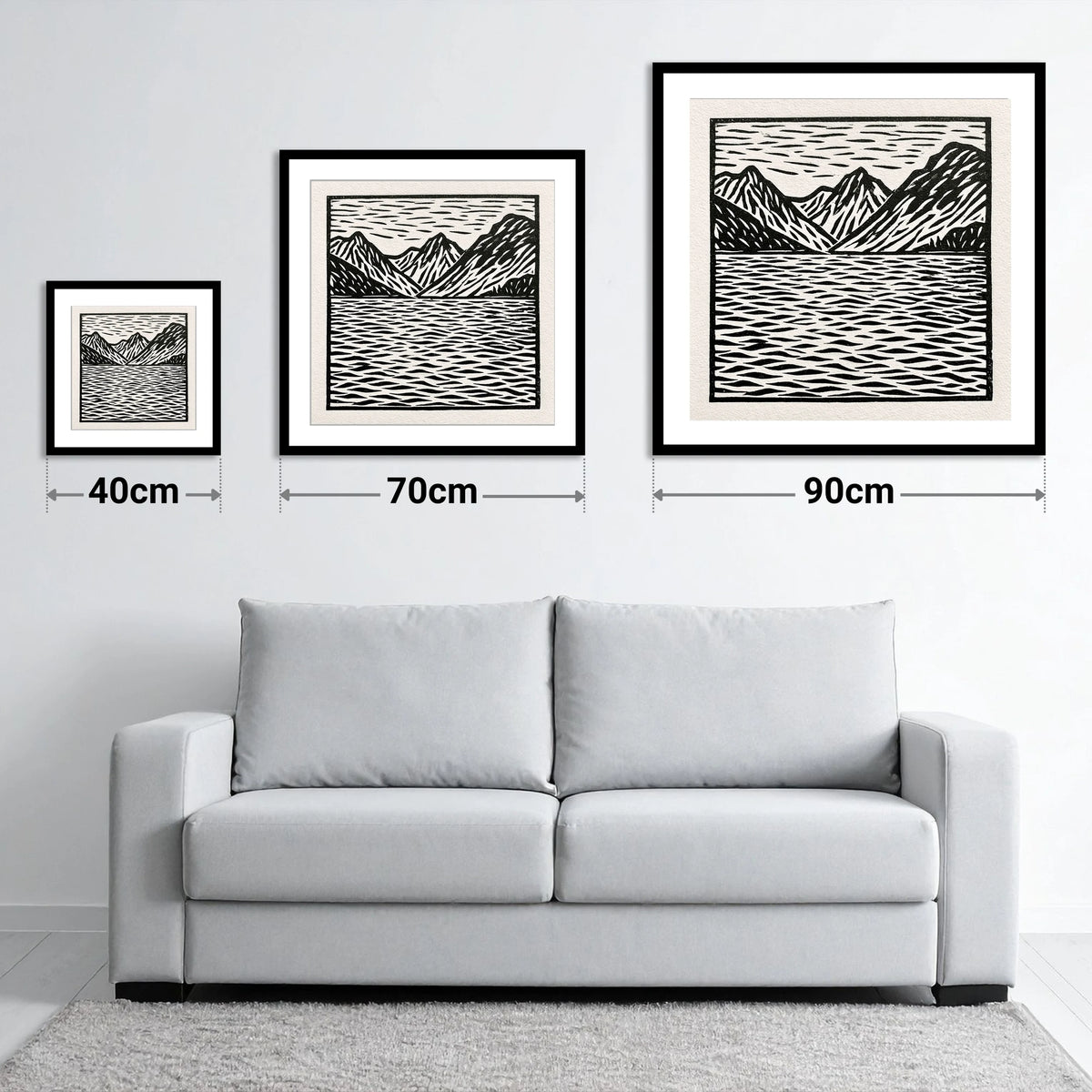 Monochrome Fells and Lake Reflections - size guide showing 40cm, 70cm and 90cm art prints
