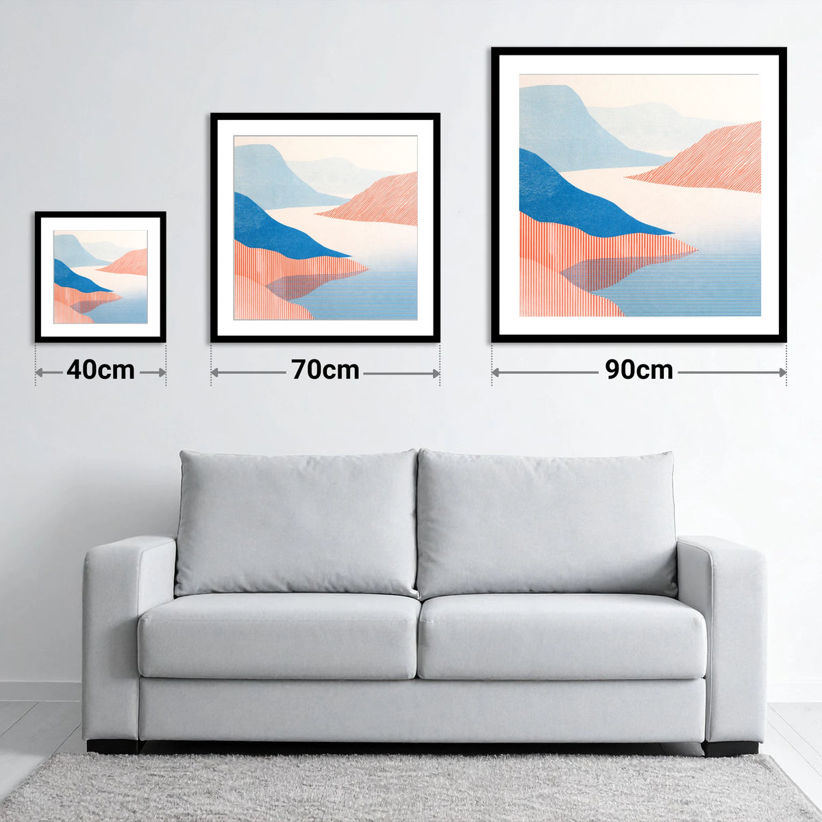 Coniston Water Fells in Coral - size guide showing 40cm, 70cm and 90cm art prints