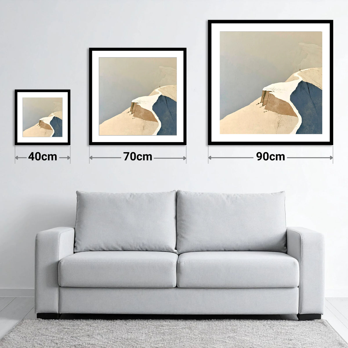 Lone Walker on a Snowy Summit Ridge - size guide showing 40cm, 70cm and 90cm art prints