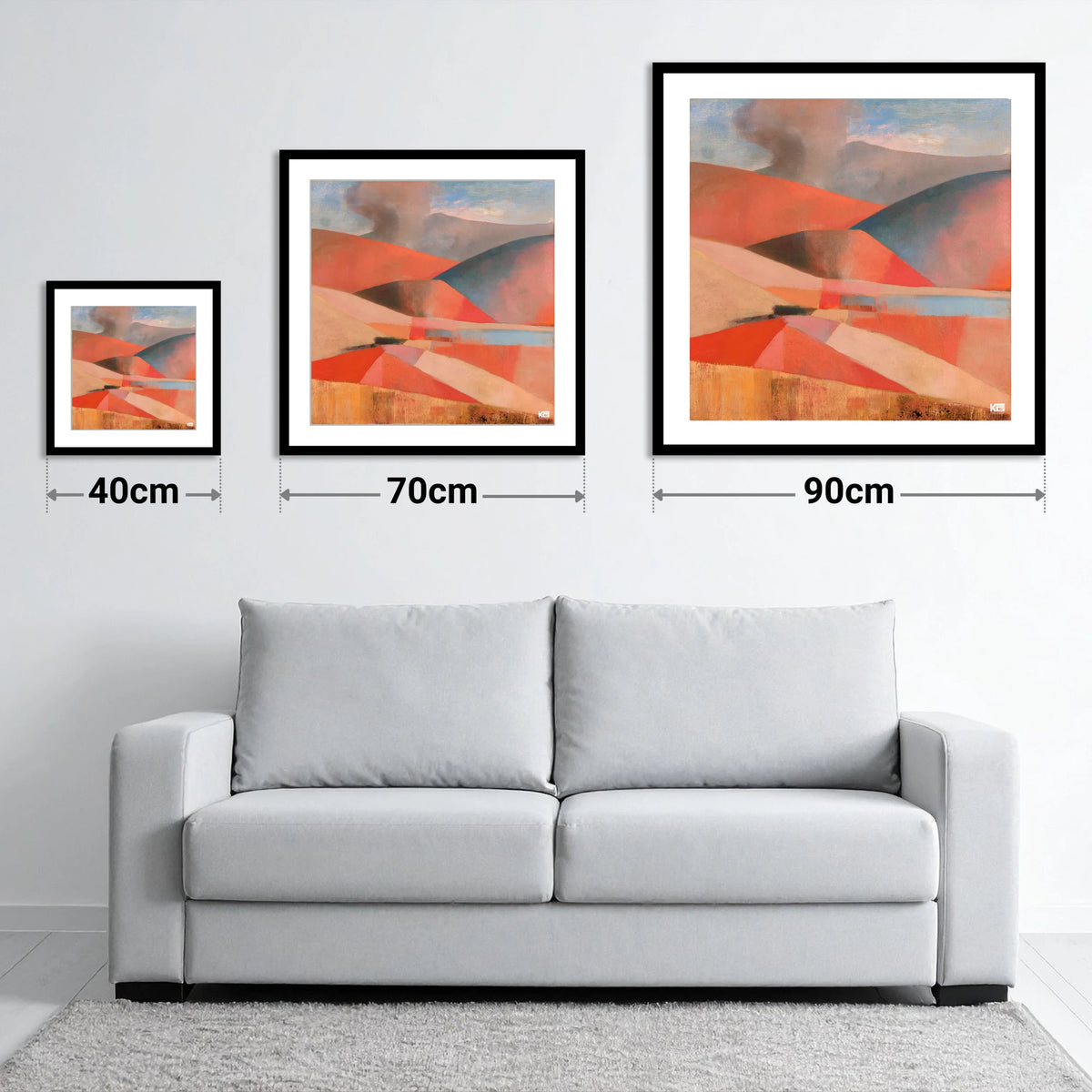Cloudy Rolling Fells in Coral - size guide showing 40cm, 70cm and 90cm art prints